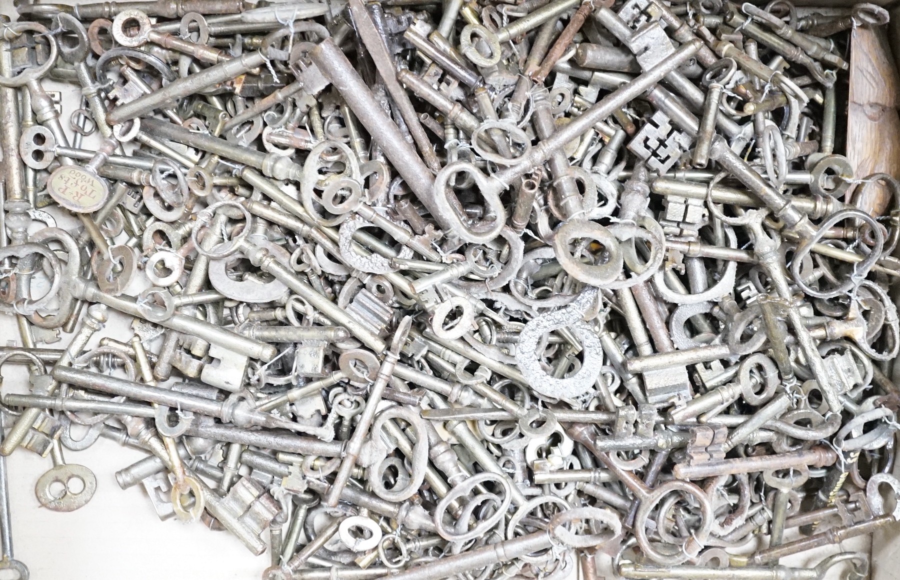 A large collection of antique keys